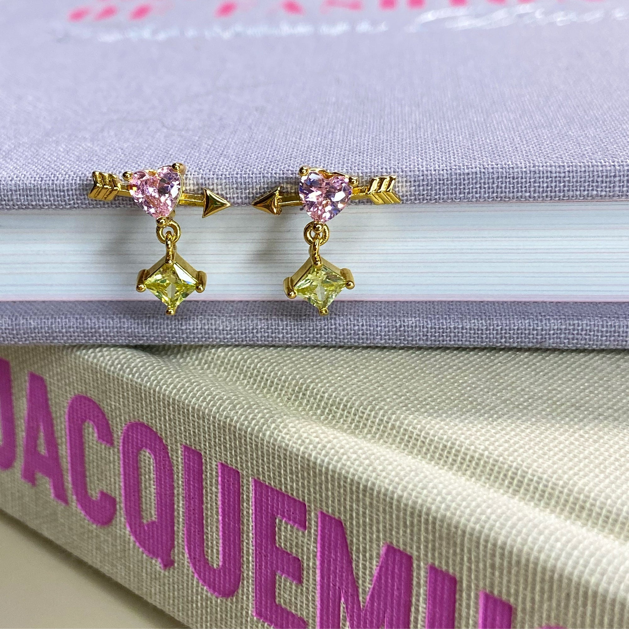 Heart cupid stud earrings.