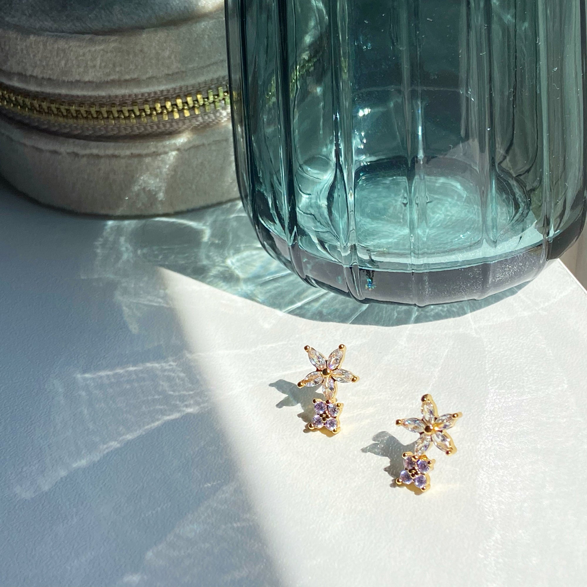 Double flower stud earrings.